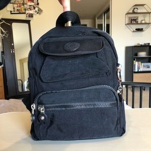 Long Kub black mini backpack. Nylon